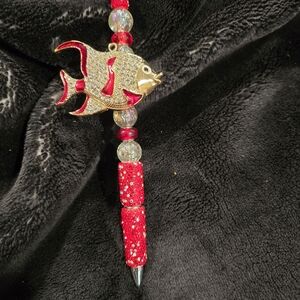 Elegant Red and Gold Fish Pen